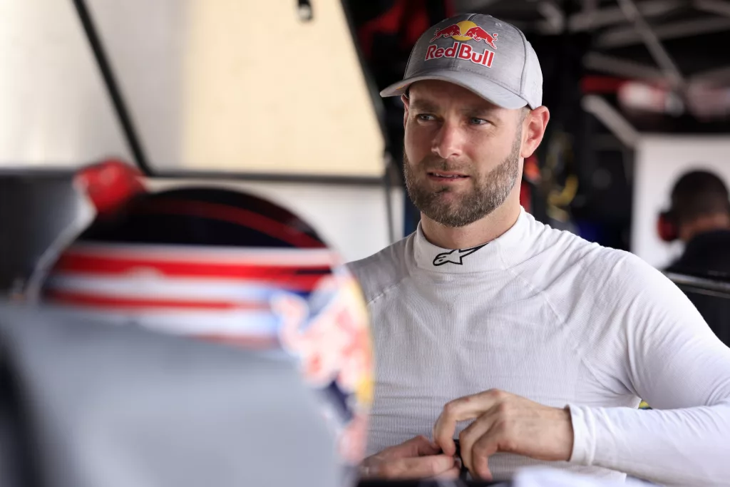 INDIANAPOLIS, INDIANA - AUGUST 11: Shane Van Gisbergen, driver of the #41 Worldwide Express Chevrolet, waits in the garage area during practice for the NASCAR Craftsman Truck Series TSport 200 at Indianapolis Raceway Park on August 11, 2023 in Indianapolis, Indiana. (Photo by Justin Casterline/Getty Images)