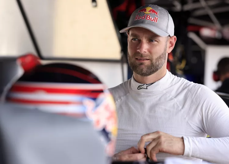 INDIANAPOLIS, INDIANA - AUGUST 11: Shane Van Gisbergen, driver of the #41 Worldwide Express Chevrolet, waits in the garage area during practice for the NASCAR Craftsman Truck Series TSport 200 at Indianapolis Raceway Park on August 11, 2023 in Indianapolis, Indiana. (Photo by Justin Casterline/Getty Images)