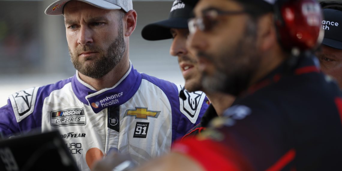 INDIANAPOLIS, INDIANA - AUGUST 12: Shane Van Gisbergen, driver of the #91 Enhance Health Chevrolet, and crew work the garage area during practice for the NASCAR Cup Series Verizon 200 at the Brickyard at Indianapolis Motor Speedway on August 12, 2023 in Indianapolis, Indiana. (Photo by Sean Gardner/Getty Images)