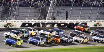 Ryan Blaney leads the field during the NASCAR Cup Series 2024 Daytona 500.