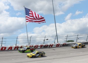 DARLINGTON, SOUTH CAROLINA - MAY 11: Shane van Gisbergen, driver of the #97 Quad Lock Chevrolet, Leland Honeyman, driver of the #42 RANDCO Industries Chevrolet, and Taylor Gray, driver of the #19 Operation 300 Toyota, race during the NASCAR Xfinity Series Crown Royal Purple Bag Project 200 at Darlington Raceway on May 11, 2024 in Darlington, South Carolina. (Photo by Meg Oliphant/Getty Images)