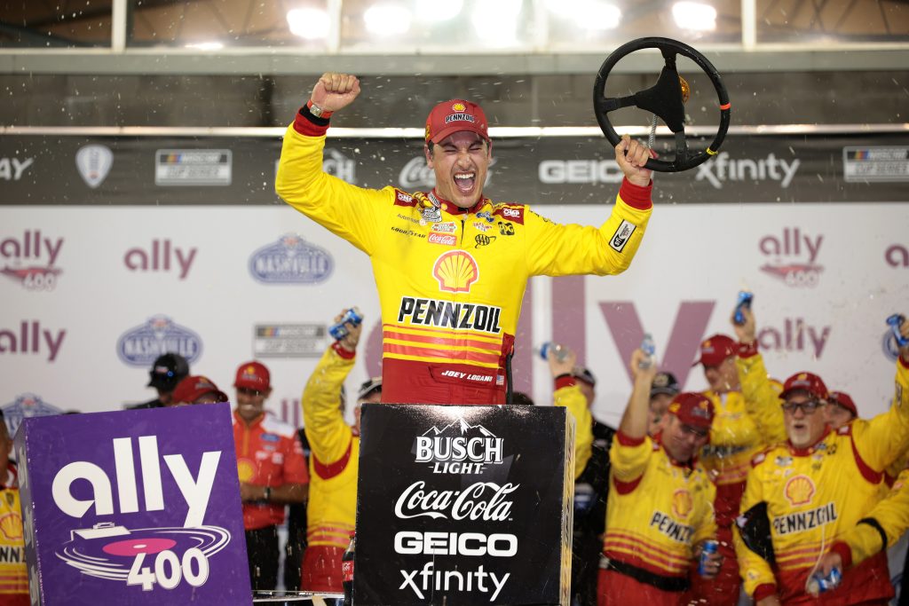 LEBANON, TENNESSEE - JUNE 30: Joey Logano, driver of the #22 Shell Pennzoil Ford, celebrates in victory lane after winning the NASCAR Cup Series Ally 400 at Nashville Superspeedway on June 30, 2024 in Lebanon, Tennessee. (Photo by James Gilbert/Getty Images)