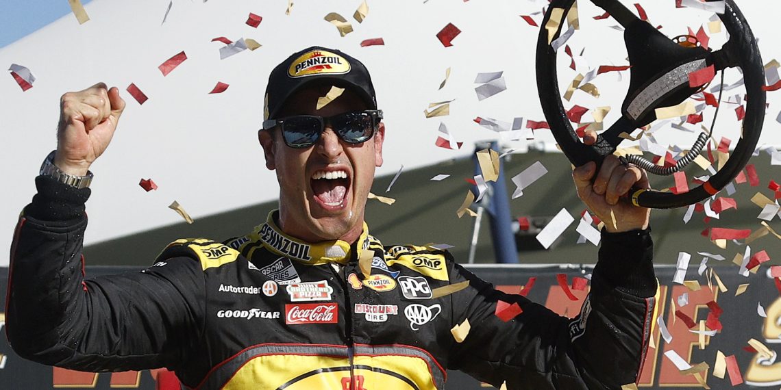 Joey Logano celebrates in victory lane after winning the NASCAR Cup Series South Point 400 at Las Vegas Motor Speedway.