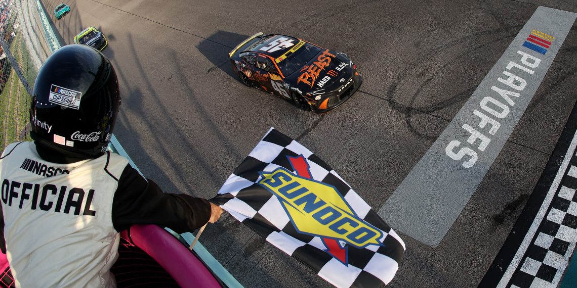 Tyler Reddick, driver of the #45 Toyota, takes the chequered flag to win the NASCAR Cup Series Straight Talk Wireless 400 at Homestead-Miami Speedway.