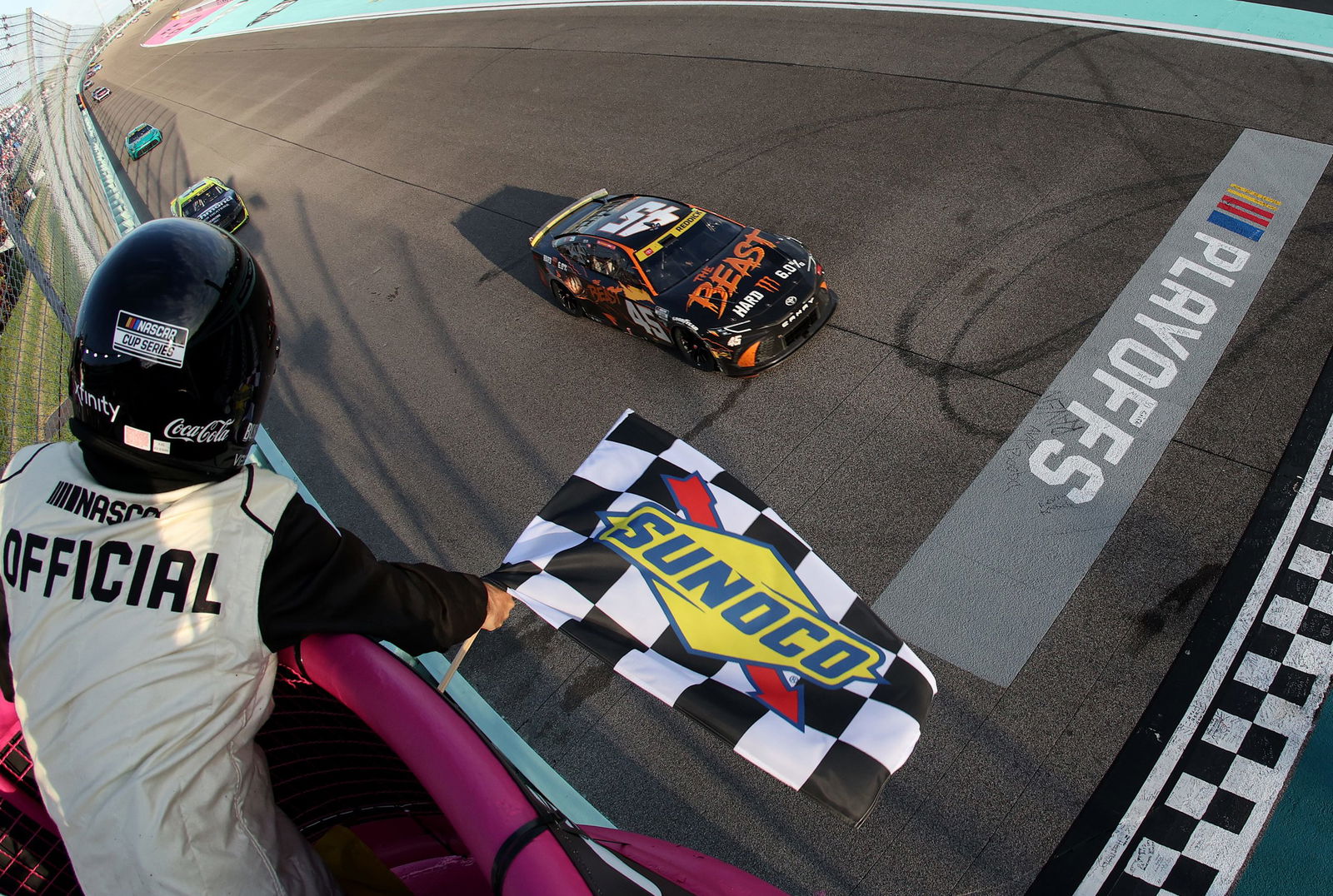 Tyler Reddick, driver of the #45 Toyota, takes the chequered flag to win the NASCAR Cup Series Straight Talk Wireless 400 at Homestead-Miami Speedway. 