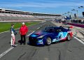 Dick Johnson (right) and Christopher Mies with a Gen3-spec Ford Mustang.