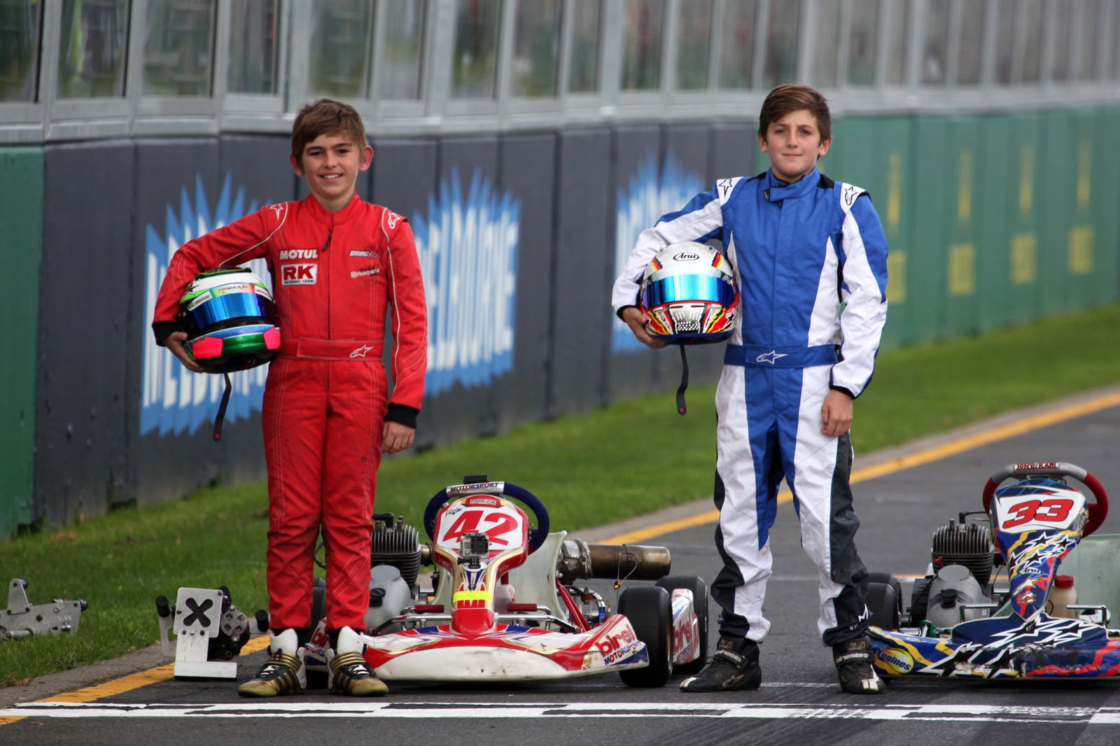 Broc Feeney (left) with Jack Doohan on the grid at the Formula 1 Australian Grand Prix. 