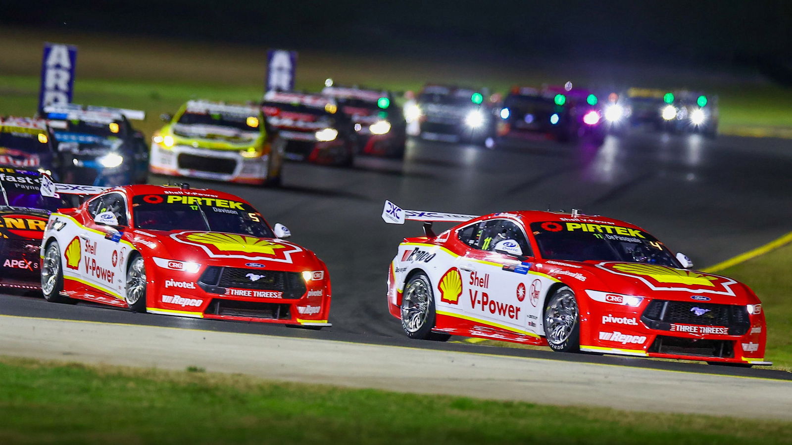 Anton De Pasquale (#11) leads Shell V-Power Racing Team stablemate Will Davison (#17) into turn two at Sydney Motorsport Park.