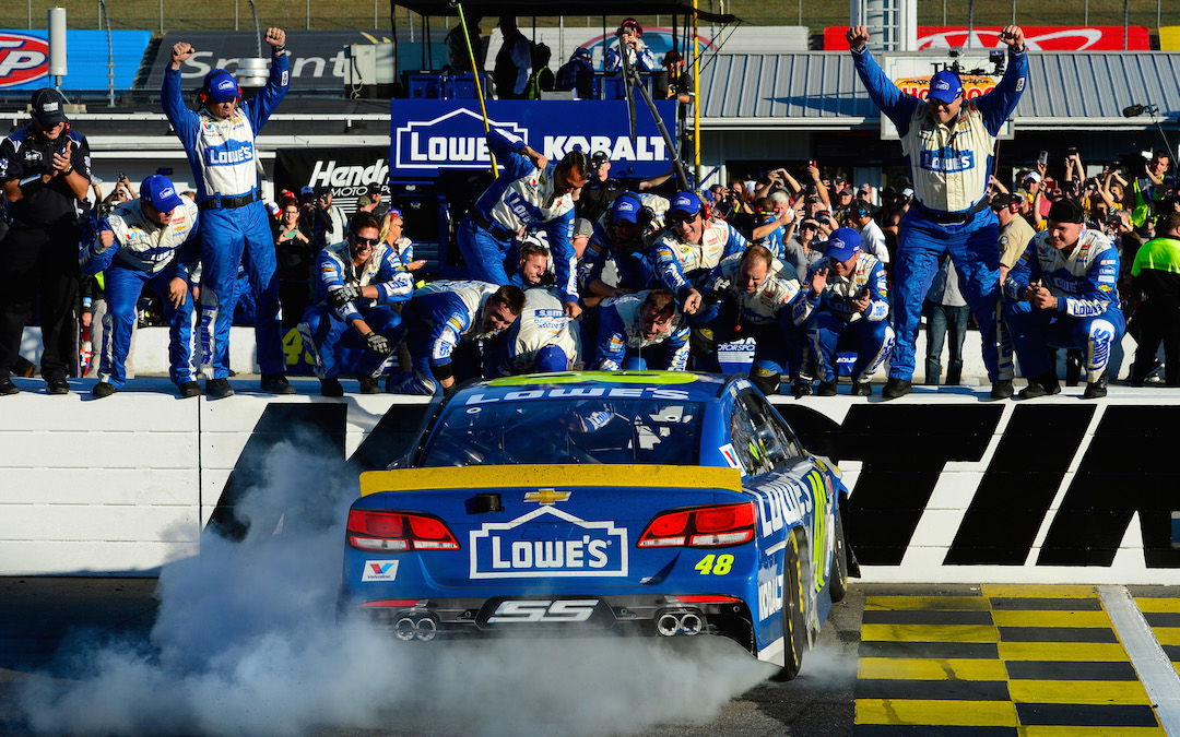Jimmie Johnson celebrates after earning a shot at a seventh NASCAR crown following victory at Martinsville 