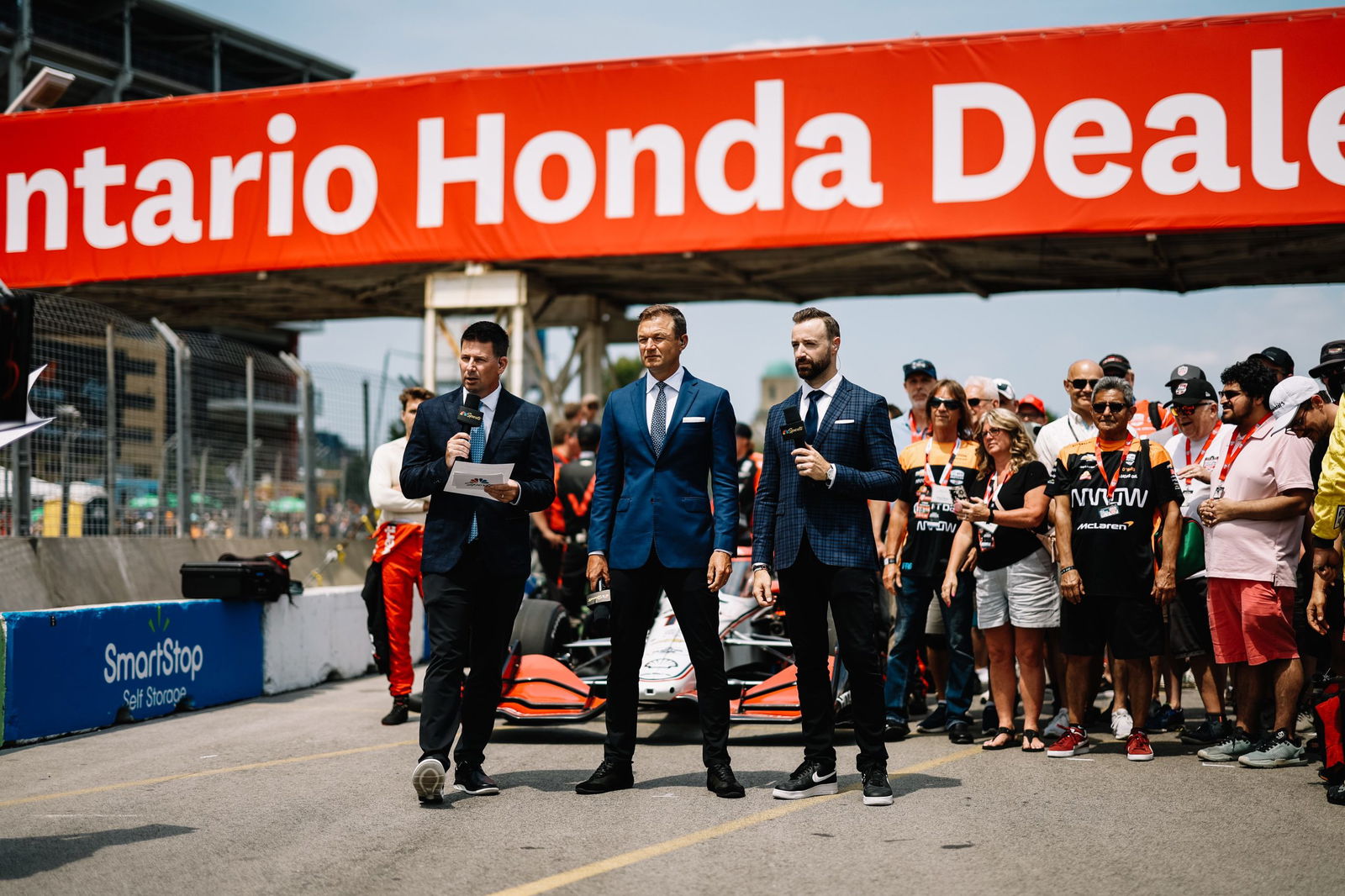 (From left) IndyCar pit lane reporter Kevin Lee, Townsend Bell, and James Hinchcliffe.