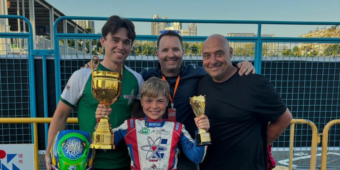 Jay Kostecki (centre) won the Macau Kart Grand Prix - L-R - World Champion & mechanic, Marijn Kremers, Kostecki, Michael Patrizi and Steven Kostecki