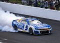 Kyle Larson celebrates victory in the Brickyard 400. Image: Jeff Hilliker