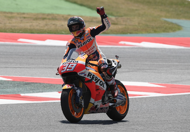 Marc Marquez reverses his numbers on the cool down lap at Catalunya in a touching gesture to honour Luis Salom who lost his life in Practice 2