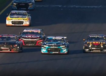 Ryan Wood (from left), Nick Percat, and Matt Payne go three-wide into turn one at Sydney Motorsport Park.