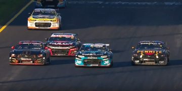 Ryan Wood (from left), Nick Percat, and Matt Payne go three-wide into turn one at Sydney Motorsport Park.