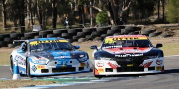 Brad Gartner had to fend off Josh Haynes in the three Sunday races at Morgan Park to win his first TA2 Muscle Car Series round. Image: TA2