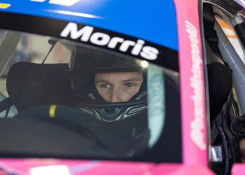 Nash Morris sits in a Porsche during a Porsche Michelin Sprint Challenge round in 2023