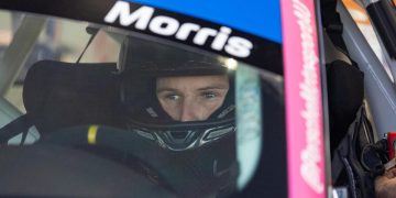 Nash Morris sits in a Porsche during a Porsche Michelin Sprint Challenge round in 2023