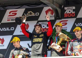 26-year-old, newly crowned Supercars champion Brodie Kostecki shares the podium with Race 28 winner Matt Payne (centre-right), runner-up and fellow 21-year-old Broc Feeney (right), and 38-year-old podium finisher David Reynolds (left). Image: InSdye Media