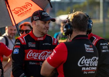 Brodie Kostecki stands on the starting grid before a Supercars race at Sydney Motorsport Park in July 2023