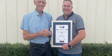 Ron Harrop receives his honour from APAC co-chair Kevin Fitzsimons