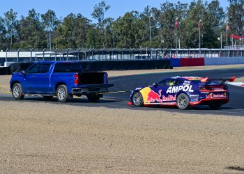 Jamie Whincup being towed back to the garage. Image: Richard Gresham