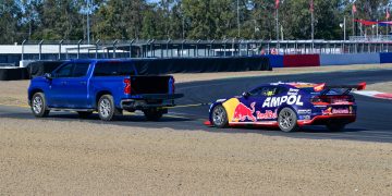 Jamie Whincup being towed back to the garage. Image: Richard Gresham