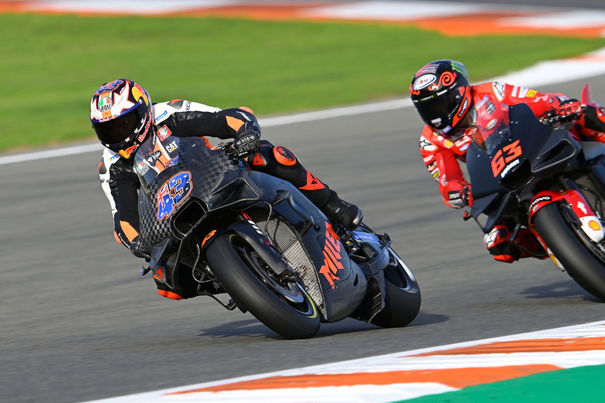 Jack Miller (#43) rides a KTM during MotoGP post-season testing, with now former team-mate Francesco Bagnaia following him