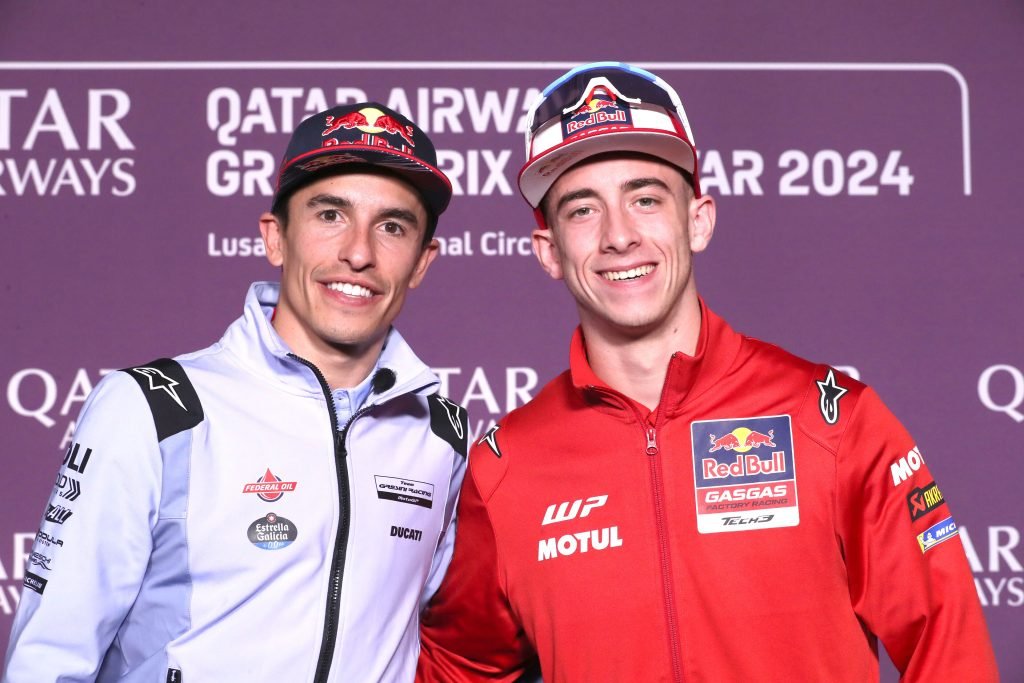 Marc Marquez and Pedro Acosta pose for a photograph on media day at the 2024 MotoGP Qatar Grand Prix, in March 2024