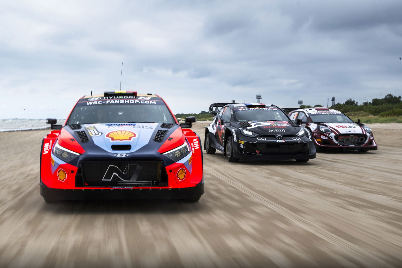 Cars from Hyuinda (left), Toyota (middle), and Ford (right).