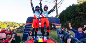 Thierry Neuville and co-driver Martijn Wydaeghe of Hyundai celebrate on the podium after winning the FIA World Rally Drivers and Co-Drivers titles at the final round the FIA World rally Championship season during the World Rally Championship in Japan.