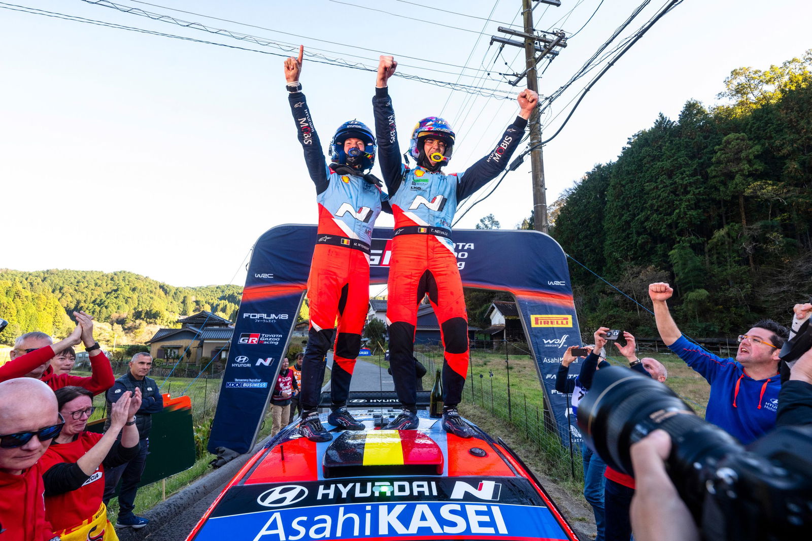 Thierry Neuville and co-driver Martijn Wydaeghe of Hyundai celebrate on the podium after winning the FIA World Rally  Drivers  and Co-Drivers titles at the final round the FIA World rally  Championship season during the World Rally Championship in Japan. 