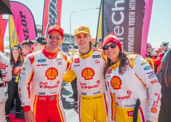 Will Davison, Kai Allen, and Simona De Silvestro pose for a photograph on the grid at the 2023 Bathurst 1000