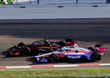 Meyer Shank Racing's Felix Rosenqvist in the #60 battles with AJ Foyt Racing's Santino Ferrucci at Iowa Speedway.