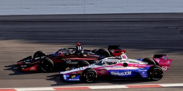 Meyer Shank Racing's Felix Rosenqvist in the #60 battles with AJ Foyt Racing's Santino Ferrucci at Iowa Speedway.