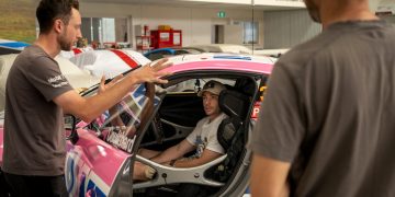 Scott Pye during a seat fitting in the Carrera Cup car which Fabian Coulthard will drive for Porsche Centre Melbourne. Image: Supplied