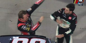 Chandler Smith (right) throws a punch at Cole Custer.