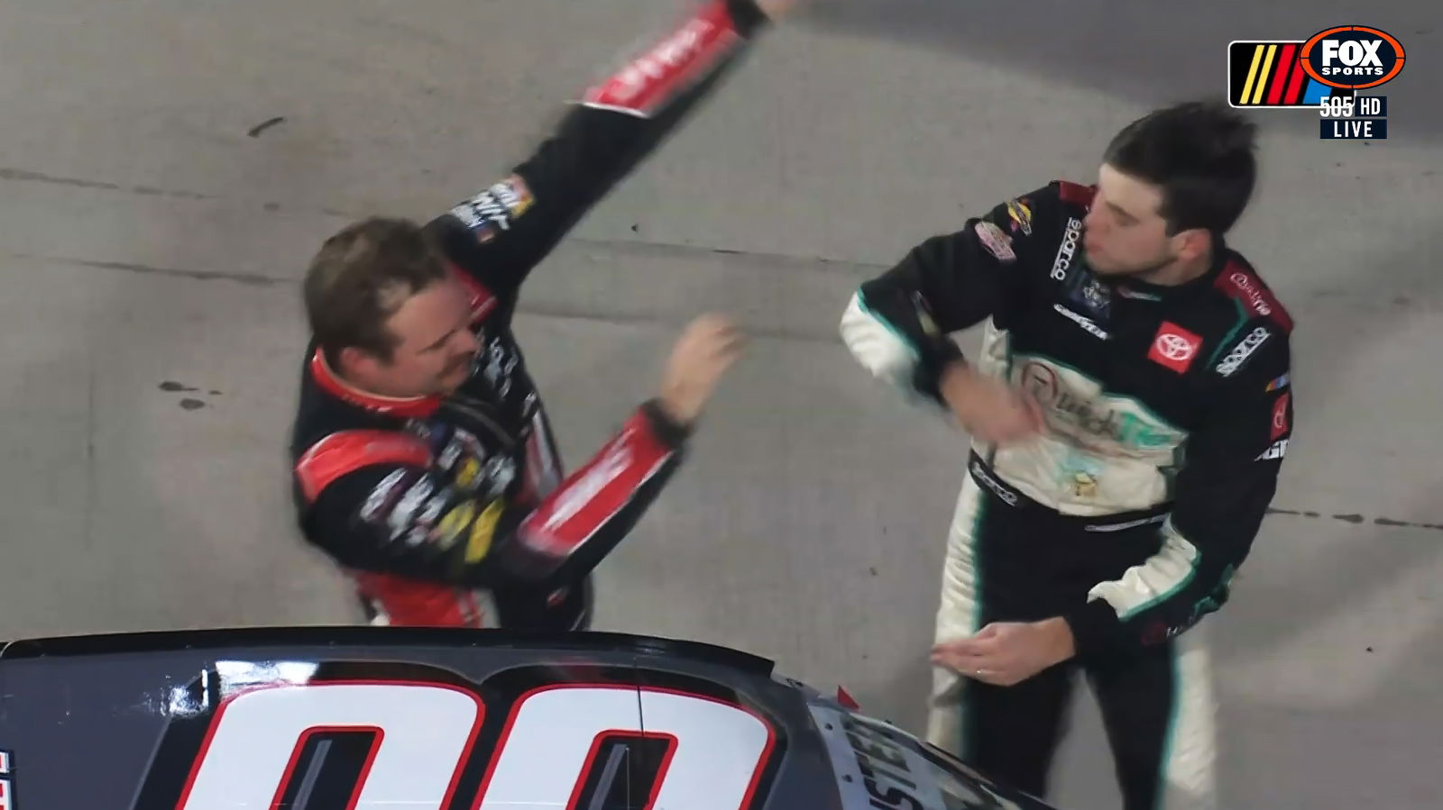 Chandler Smith (right) throws a punch at Cole Custer.