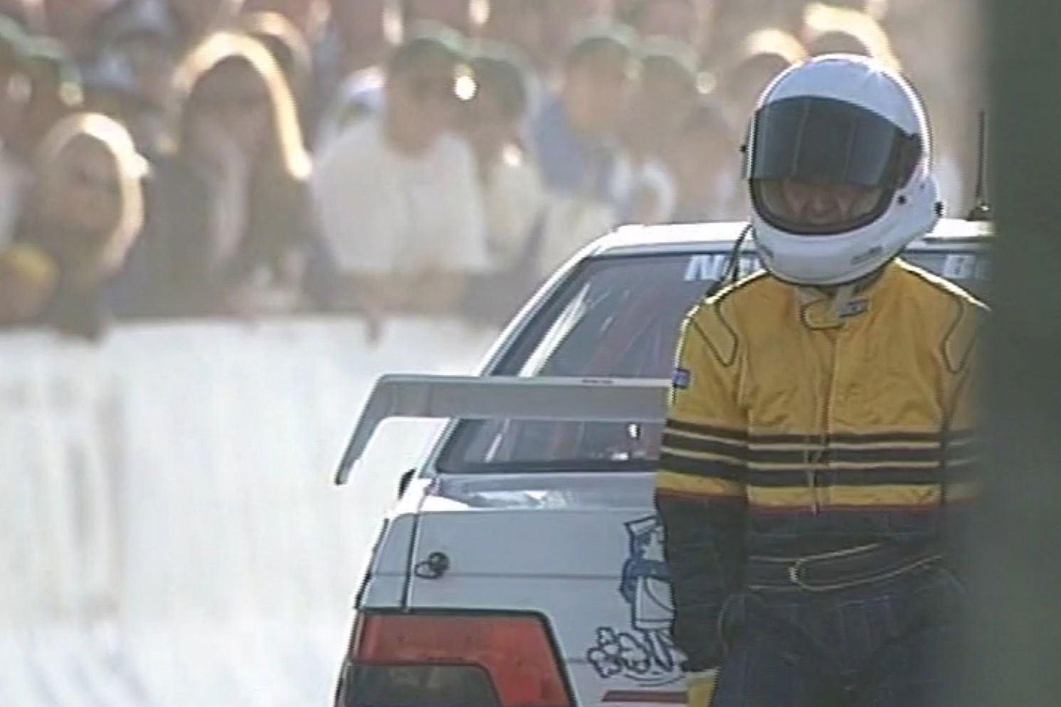 Dwayne Bewley pushes his Peugeot 405 across the start-finish line in the 1997 Bathurst 1000.