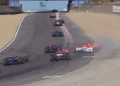 Scott McLaughlin spins after hitting Will Power in the Laguna Seca IndyCar race. Image: Stan Sport
