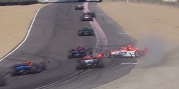 Scott McLaughlin spins after hitting Will Power in the Laguna Seca IndyCar race. Image: Stan Sport