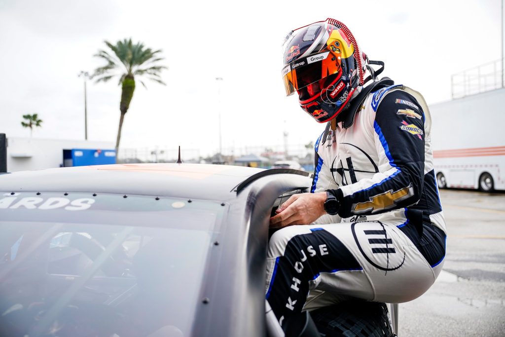 Shane van Gisbergen climbs out of a Chevrolet SS during an ARCA test at Daytona in January 2024