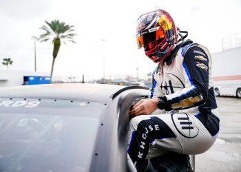 Shane van Gisbergen climbs out of a Chevrolet SS during an ARCA test at Daytona in January 2024