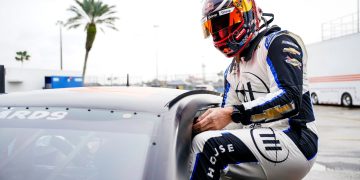 Shane van Gisbergen climbs out of a Chevrolet SS during an ARCA test at Daytona in January 2024
