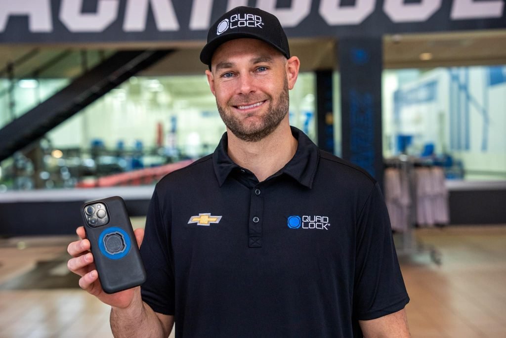 Shane van Gisbergen with his Quad Lock-equipped mobile phone. Image: Supplied