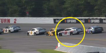 Shane van Gisbergen (circled) is spun by Sam Mayer with eight laps to go at Pocono Speedway.