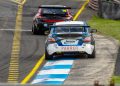 Super3 Nissan chases Super2 Holden at Sandown.