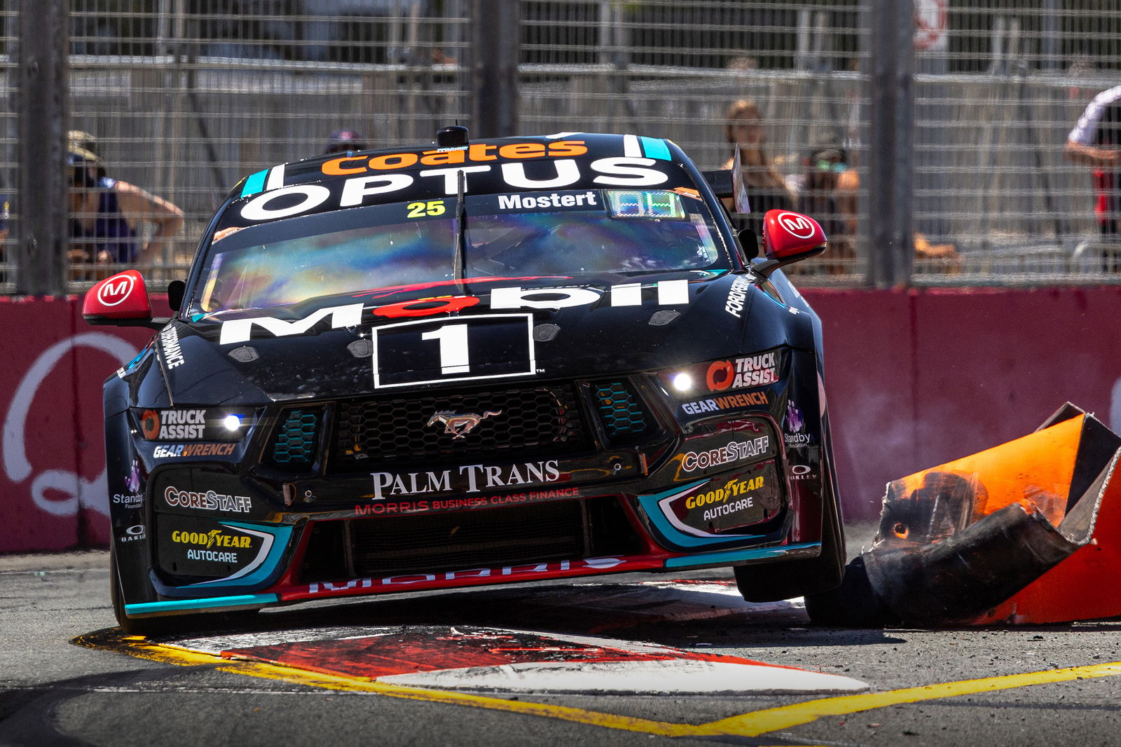 Chaz Mostert hits a tyre bundle with his Ford Mustang,