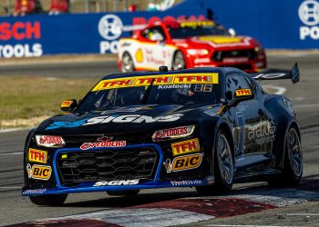 A Dick Johnson Racing Ford Mustang behind Erebus Motorsport's Brodie Kostecki at Wanneroo Raceway.