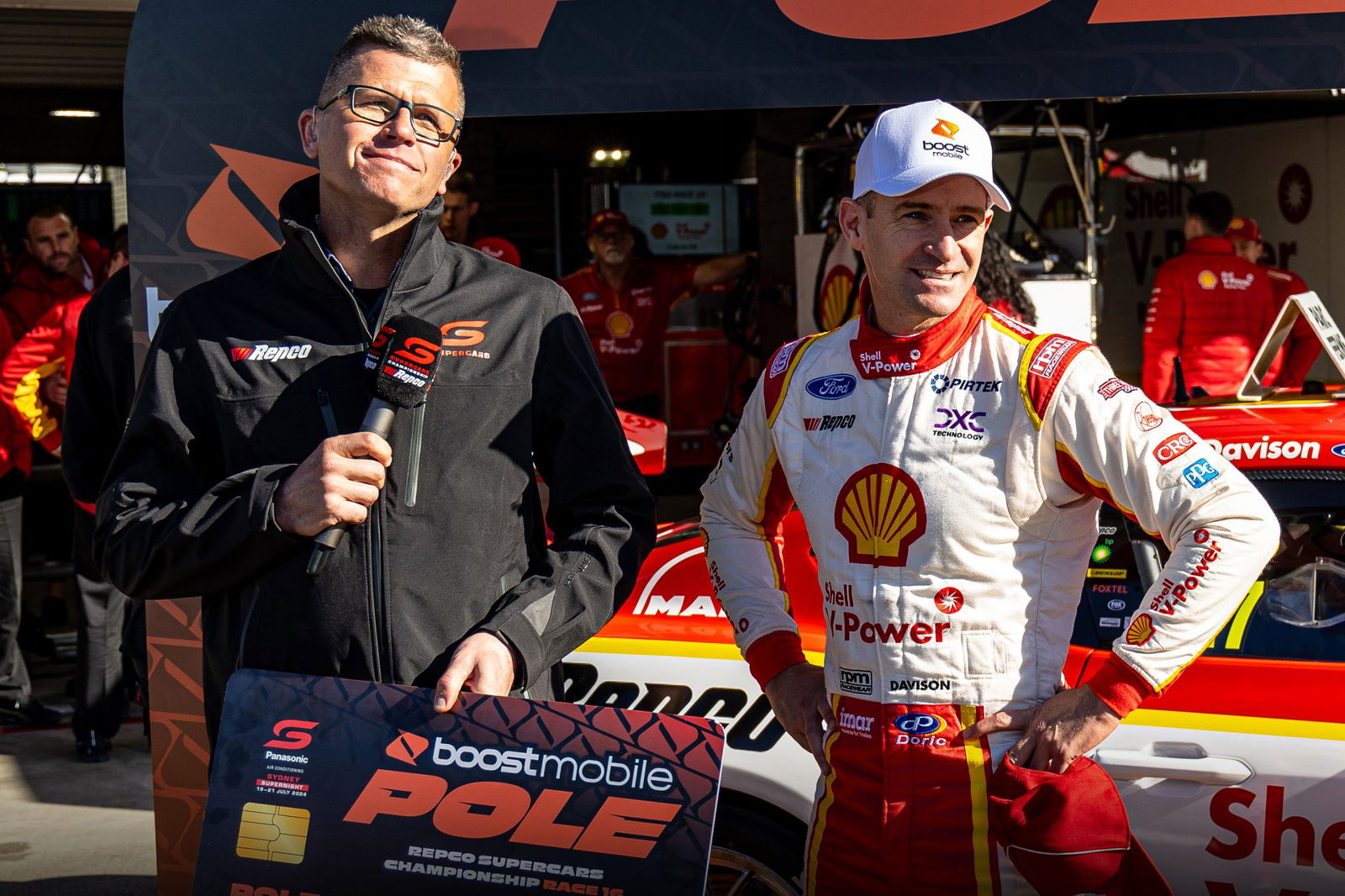 Garth Tander (left) with Race 16 pole position winner Will Davison.